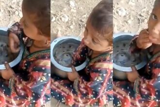 A Little Girl can be seen Pretending to Eat from an Empty Pot [Video]