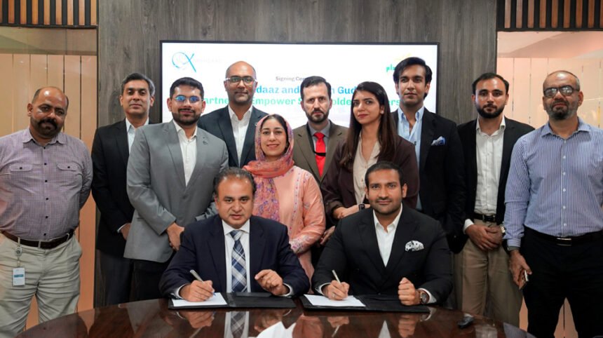 Karandaaz and Kissan Gudam partnership signing